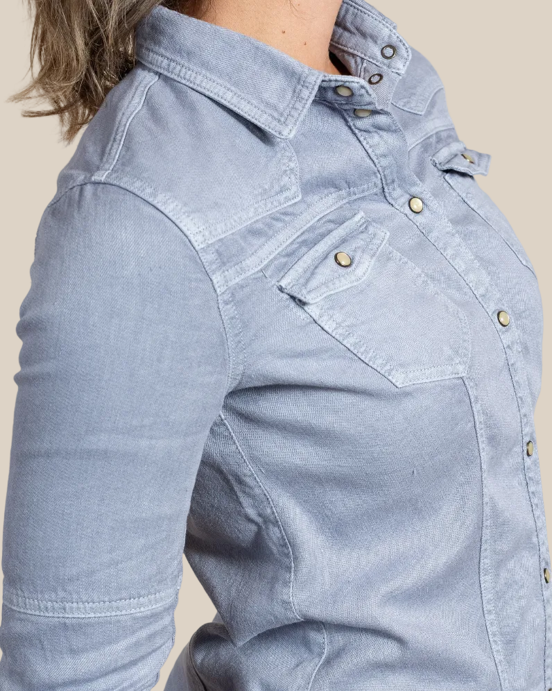 side view — tailored relaxed silhouette, snap front, fabric detail