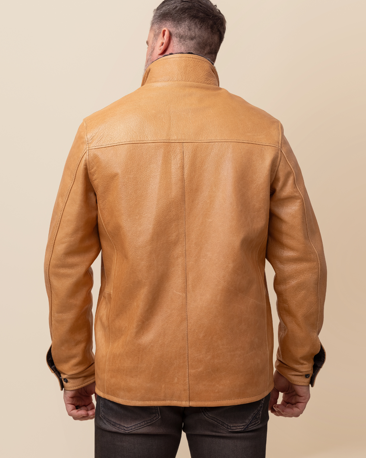 HYDE Canyon — three-quarter view showing grey shearling double collar and zip closure, waxy camel cowhide, USA-made