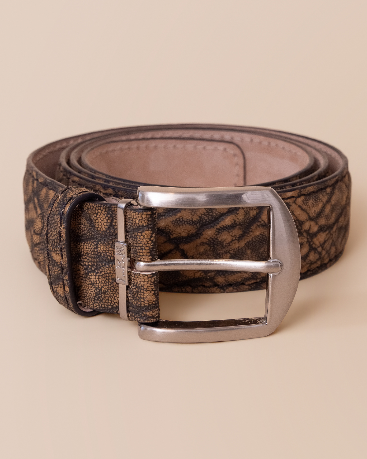 HYDE Atlas Elephant Antique Saddle Leather Belt — full view showing natural pebbled elephant hide grain and antique saddle finish