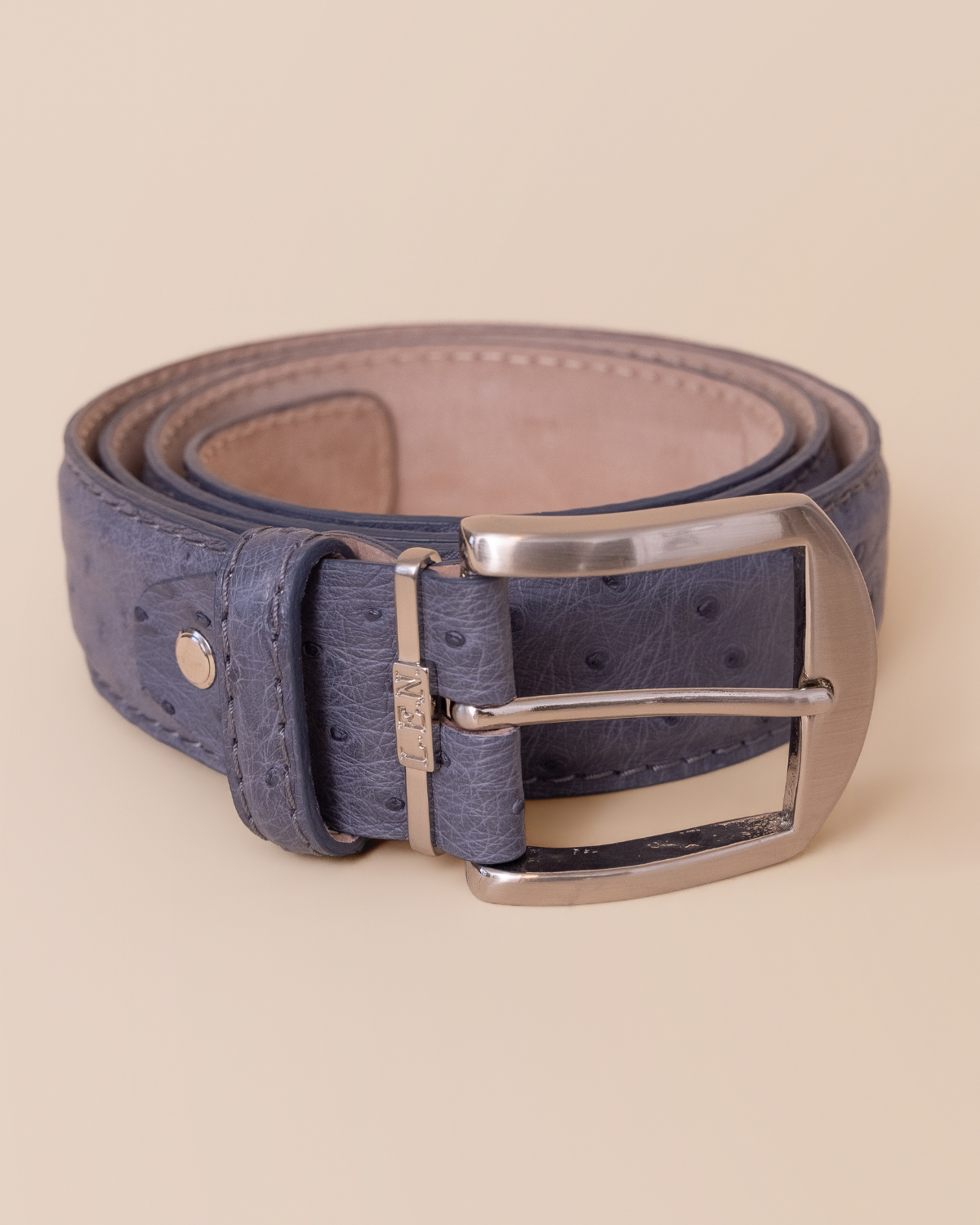 full view — natural quill texture and hand-burnished steel blue finish
