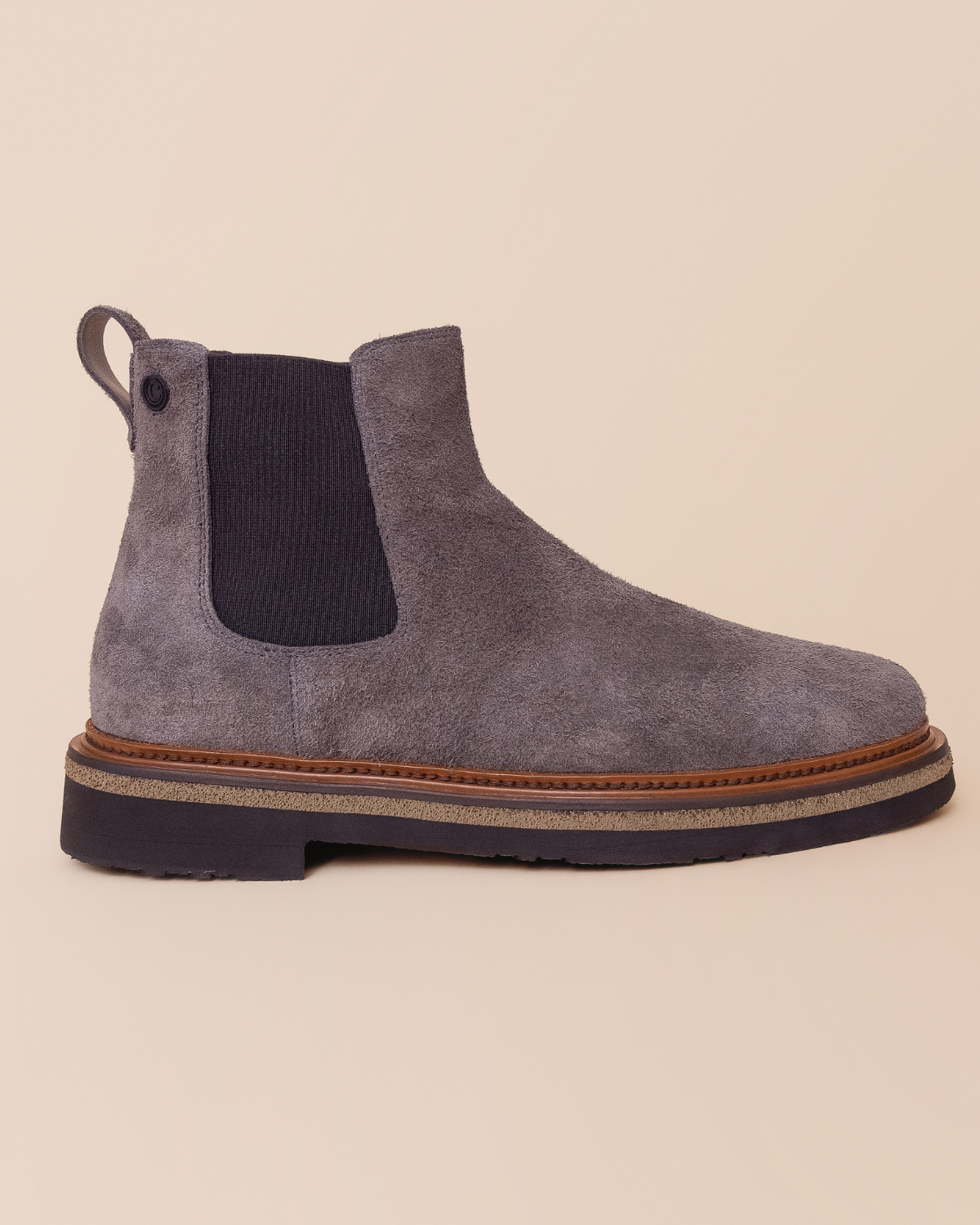 Chelsea silhouette, pull-tab heel, structured sole
