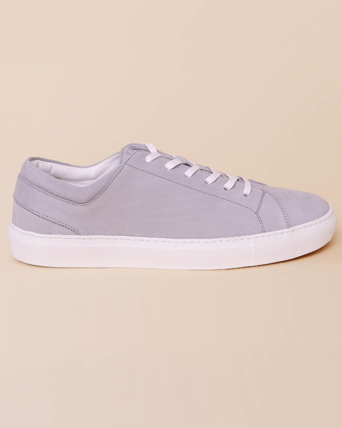side profile — nabuk texture, tonal stitching, rubber sole