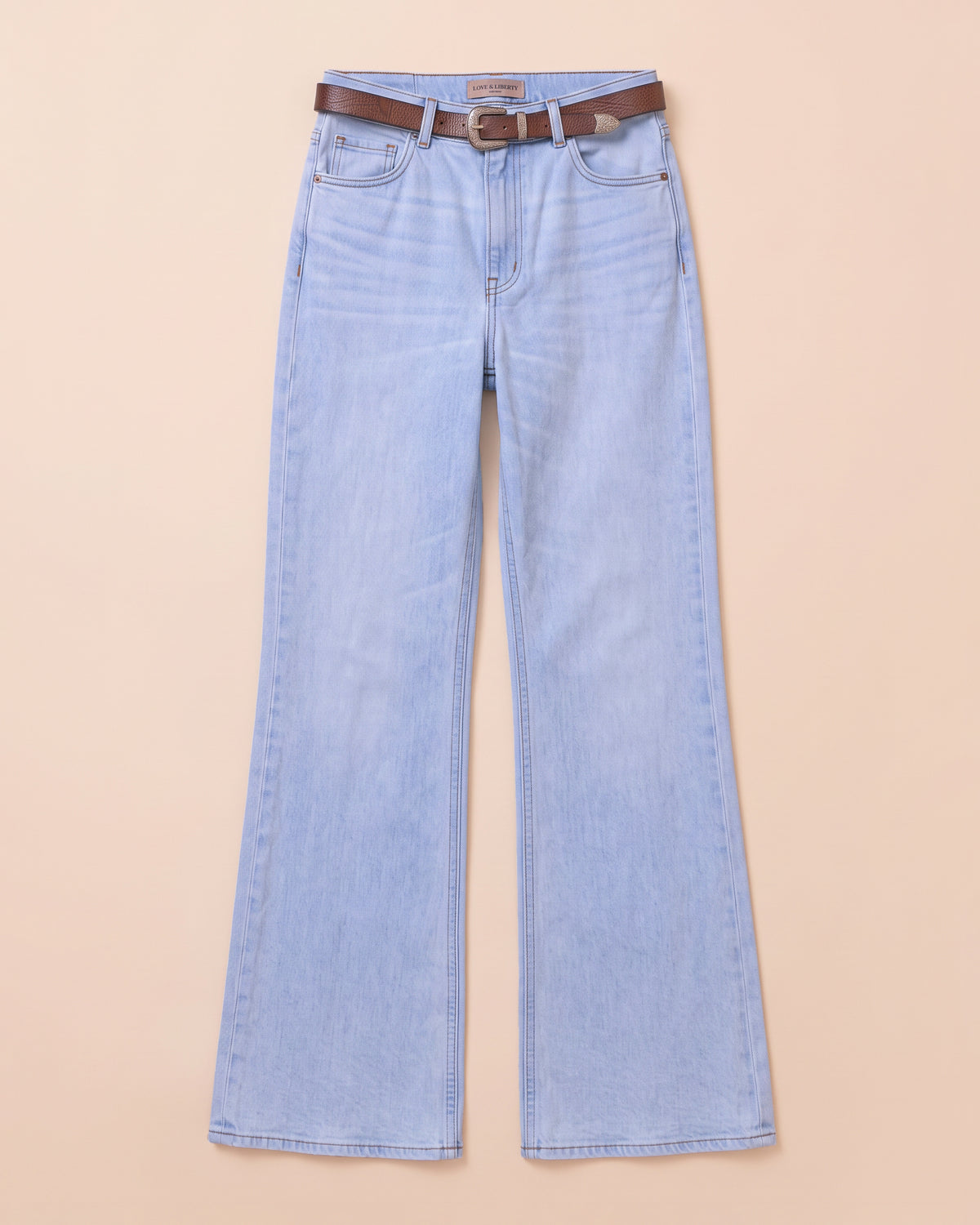 HYDE Martina Wide-Leg Denim in Light Vintage Wash, flat-lay front view of the high-rise wide-leg jeans with a brown leather belt