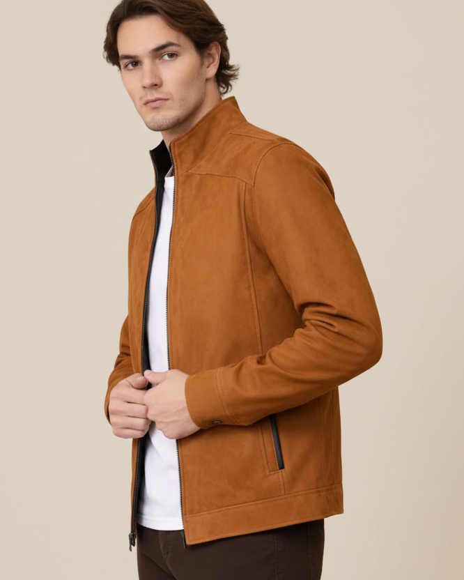 Man wearing a brown jacket over a white shirt on a beige background