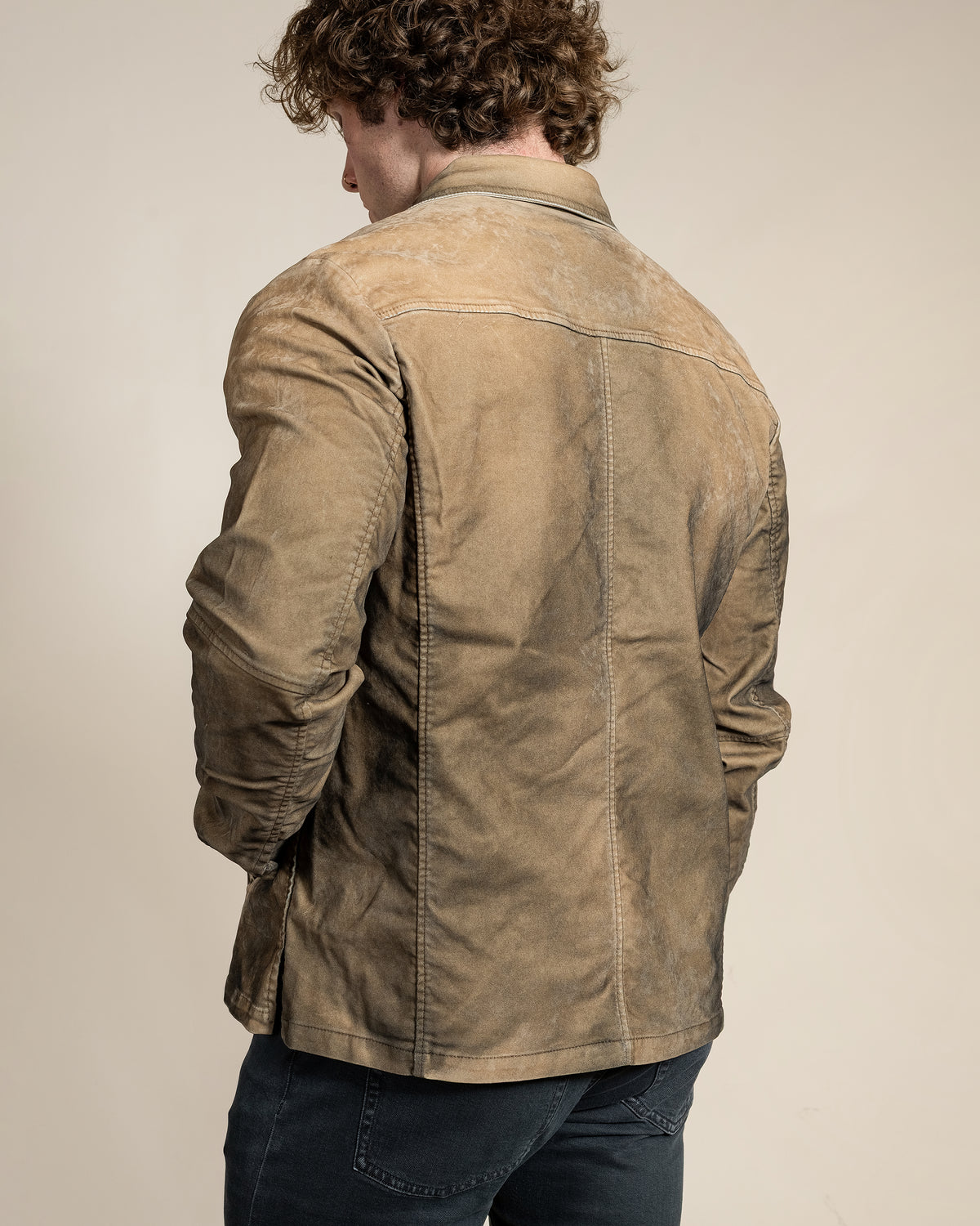 Back view of the HYDE Sawyer Jacket in Desert, highlighting the Western back yoke and sandblasted sand-toned finish.