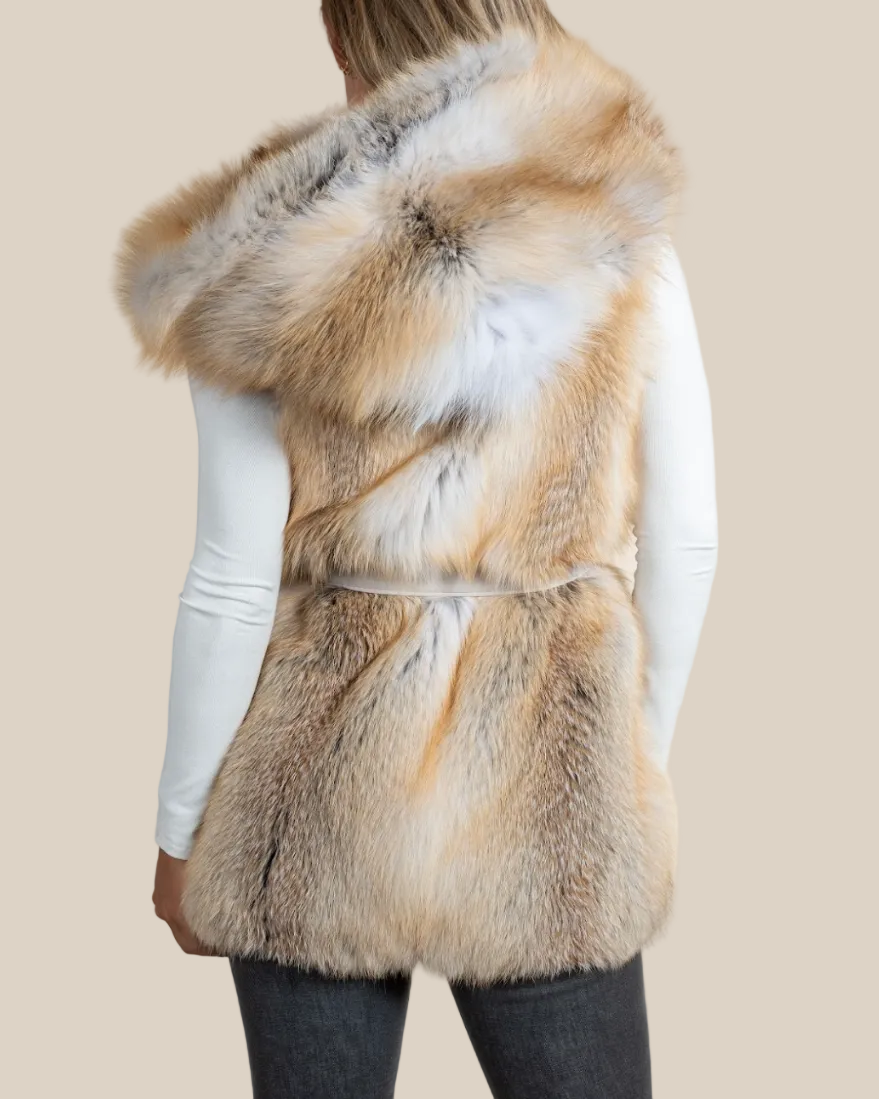 Fur vest worn by a person on a beige background