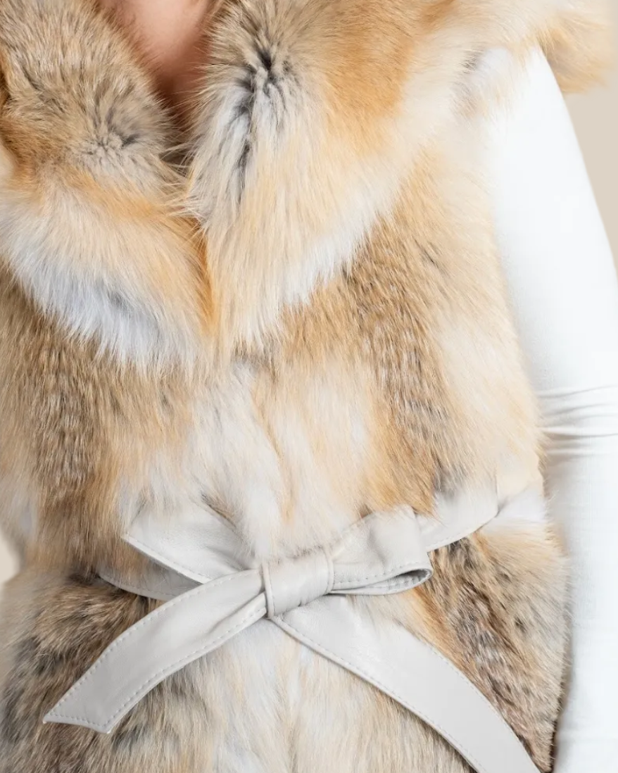 Close-up of a fur vest with a neutral background