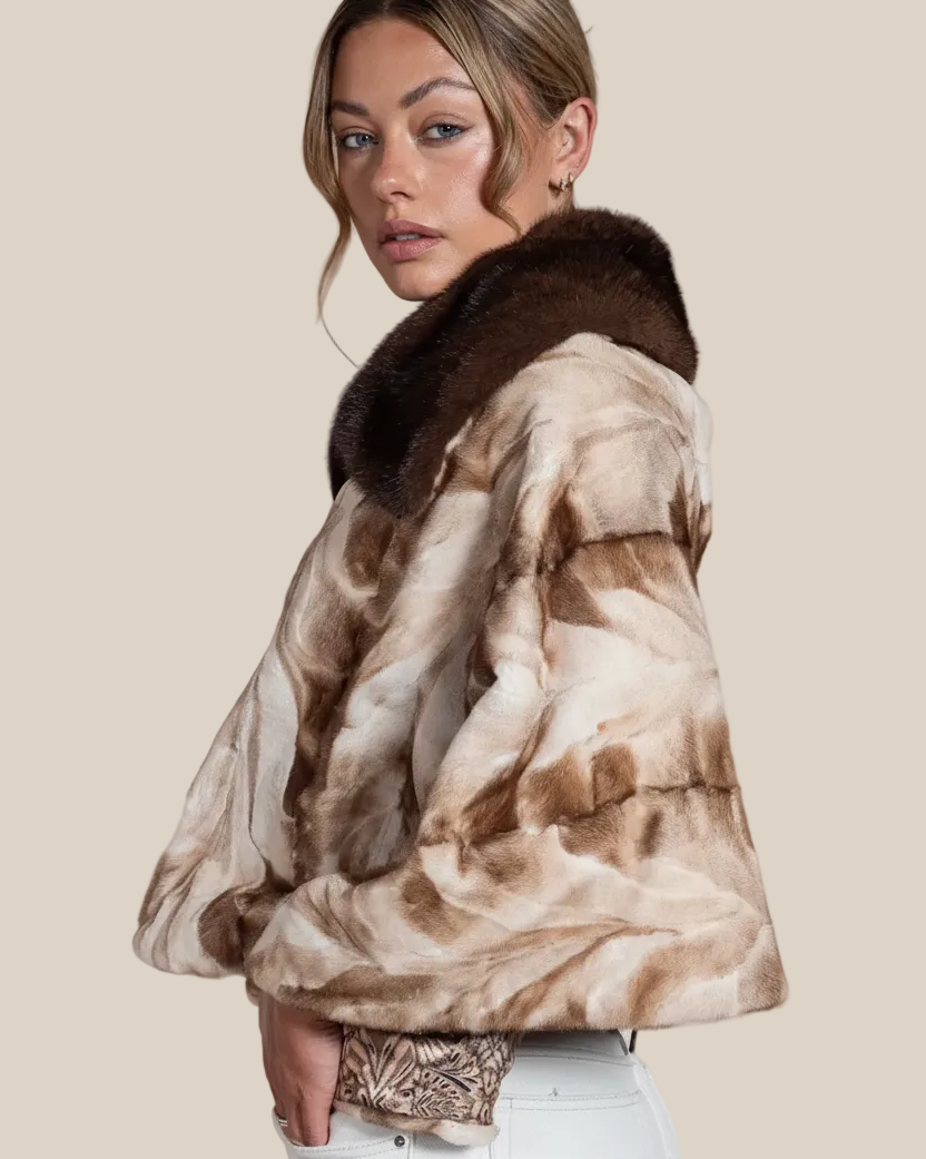 Woman wearing a fur coat with a neutral background