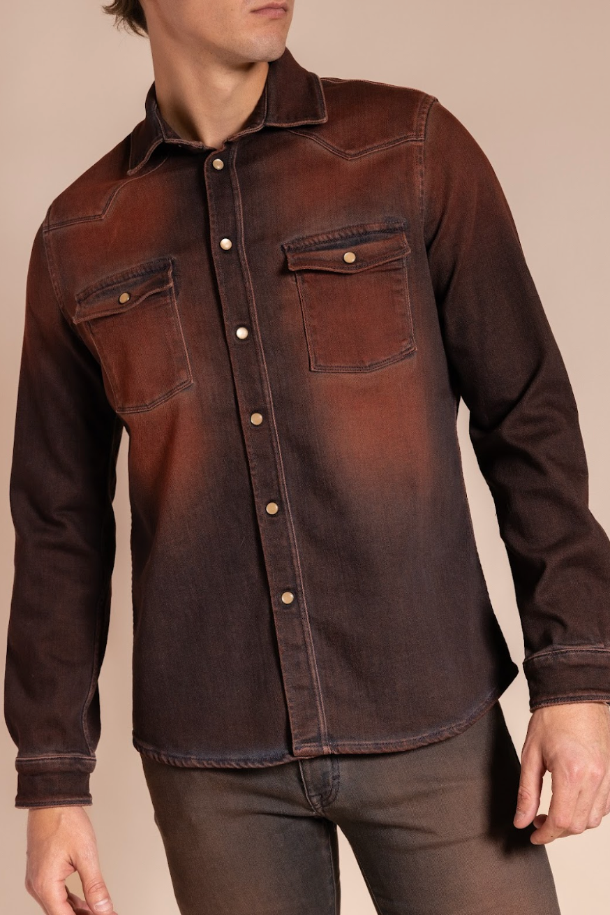 Brown leather shirt worn by a person on a beige background