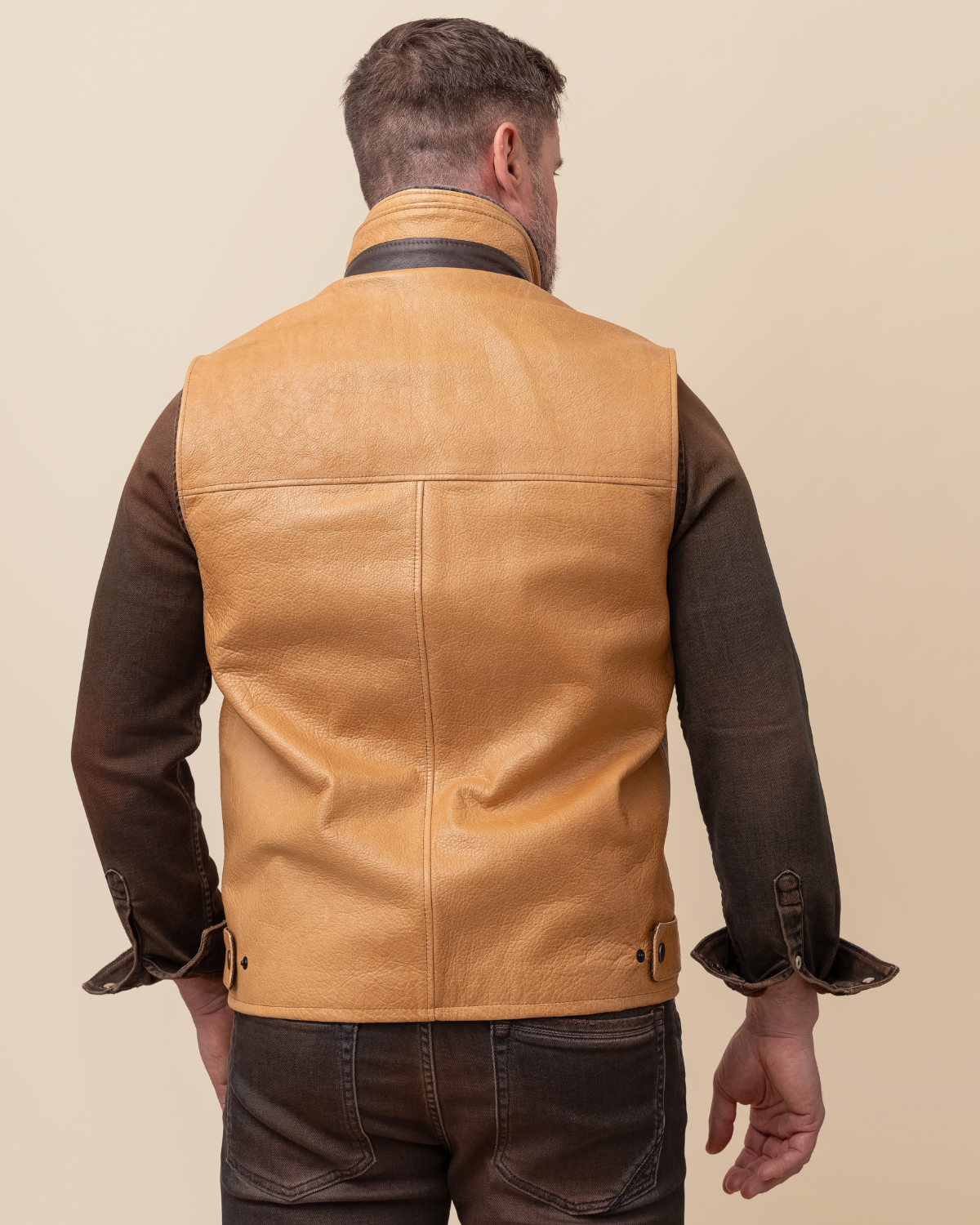 HYDE Range Vest — rear view, waxy camel cowhide western vest with wool-cashmere lining, USA-made, sizes 36–52