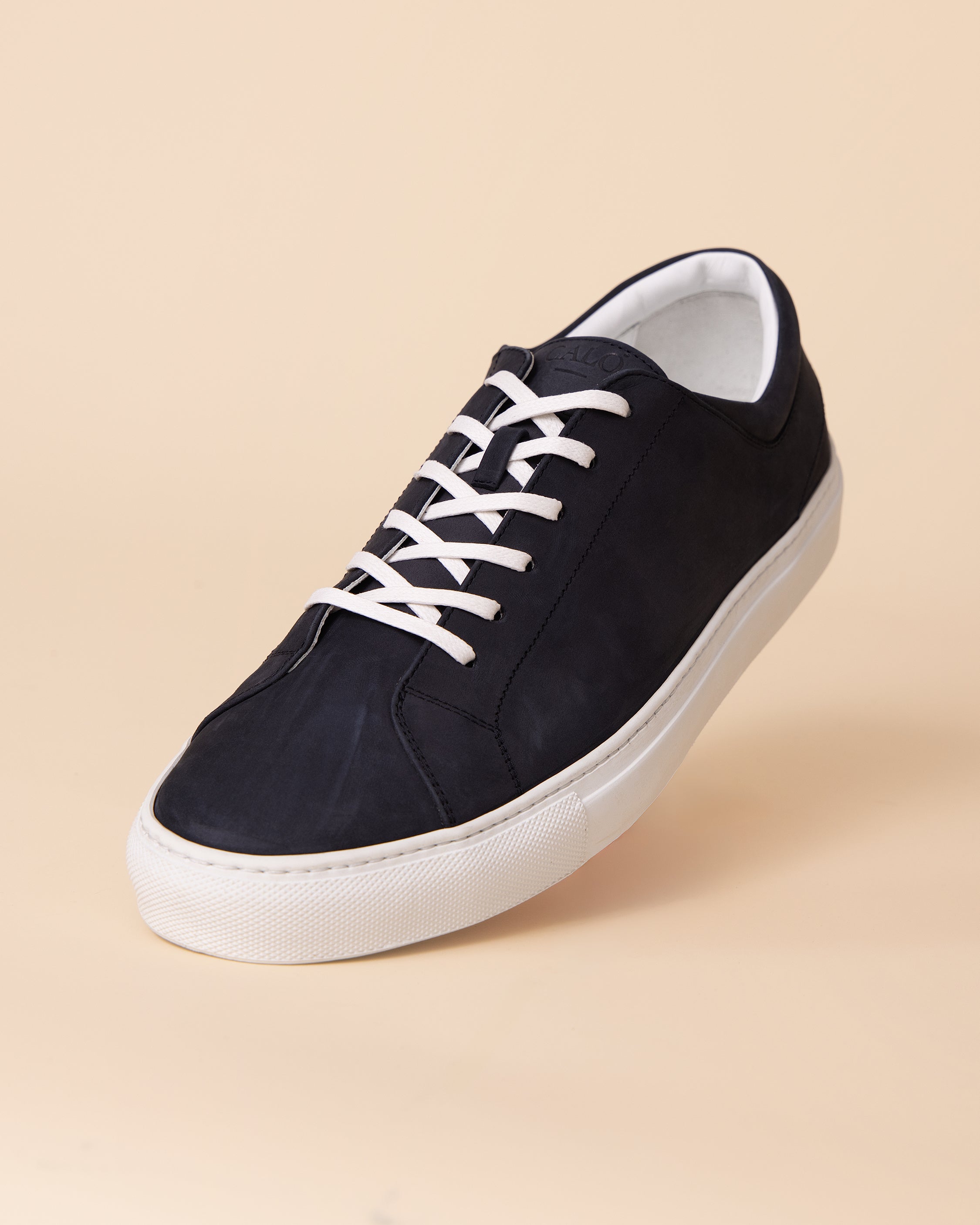 Navy nabuk leather sneaker showing soft matte finish and tonal stitching, HYDE Vulcano men's Italian sneaker