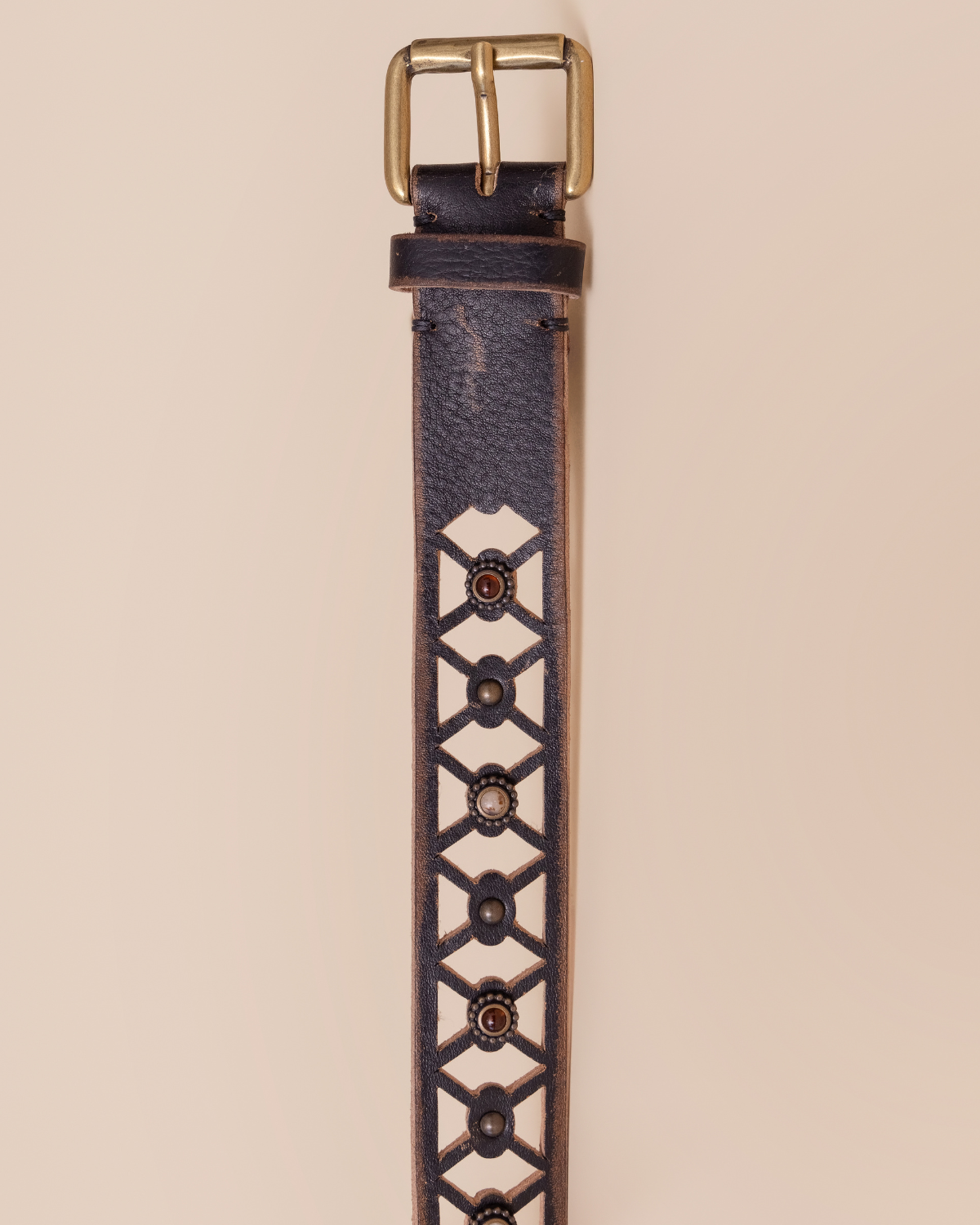 close-up of cutout detailing and stud accents