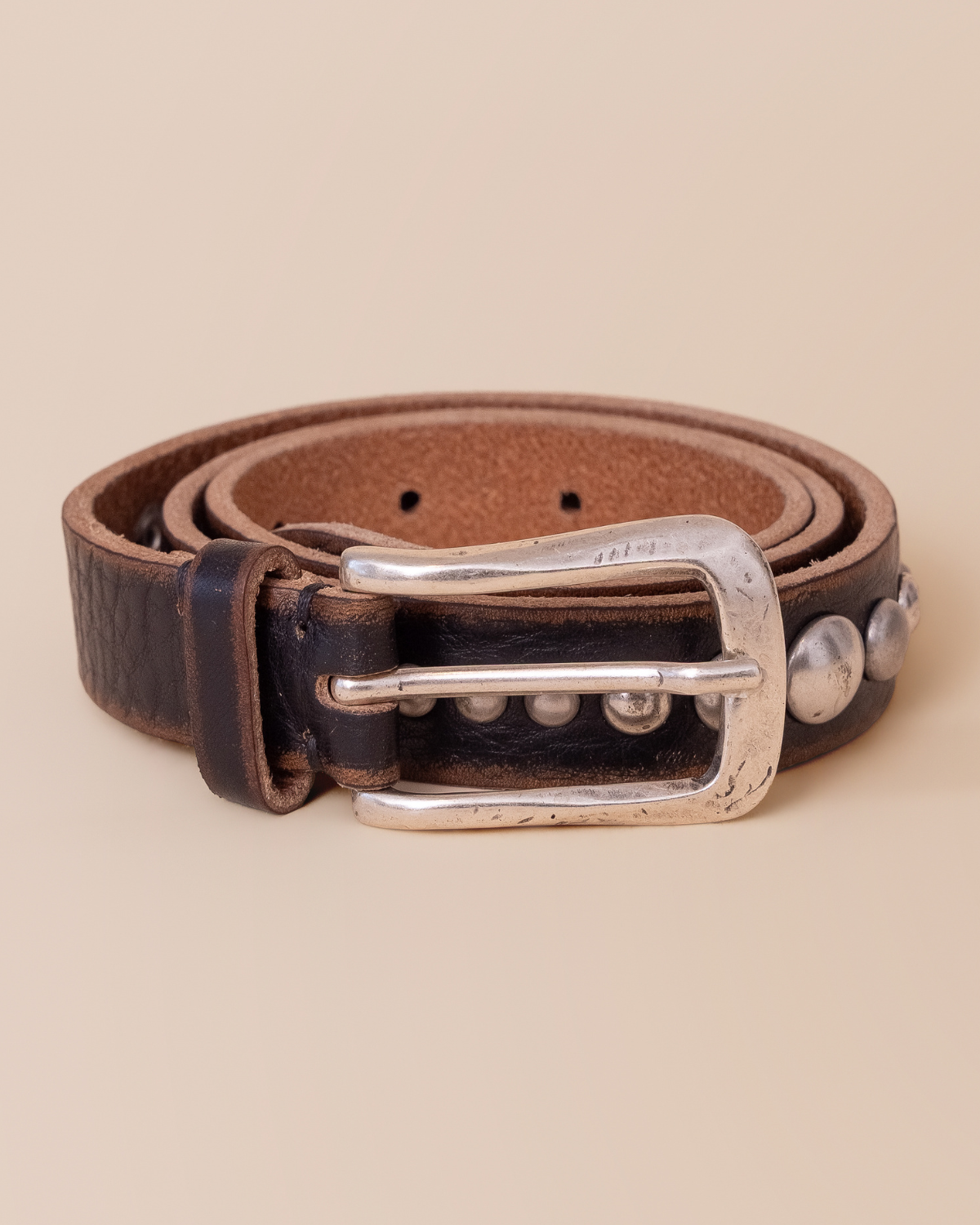 full strap view with textured leather and stud detailing