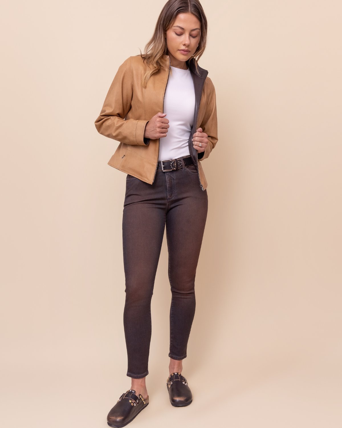 styled look — backless silhouette and distressed leather patina
