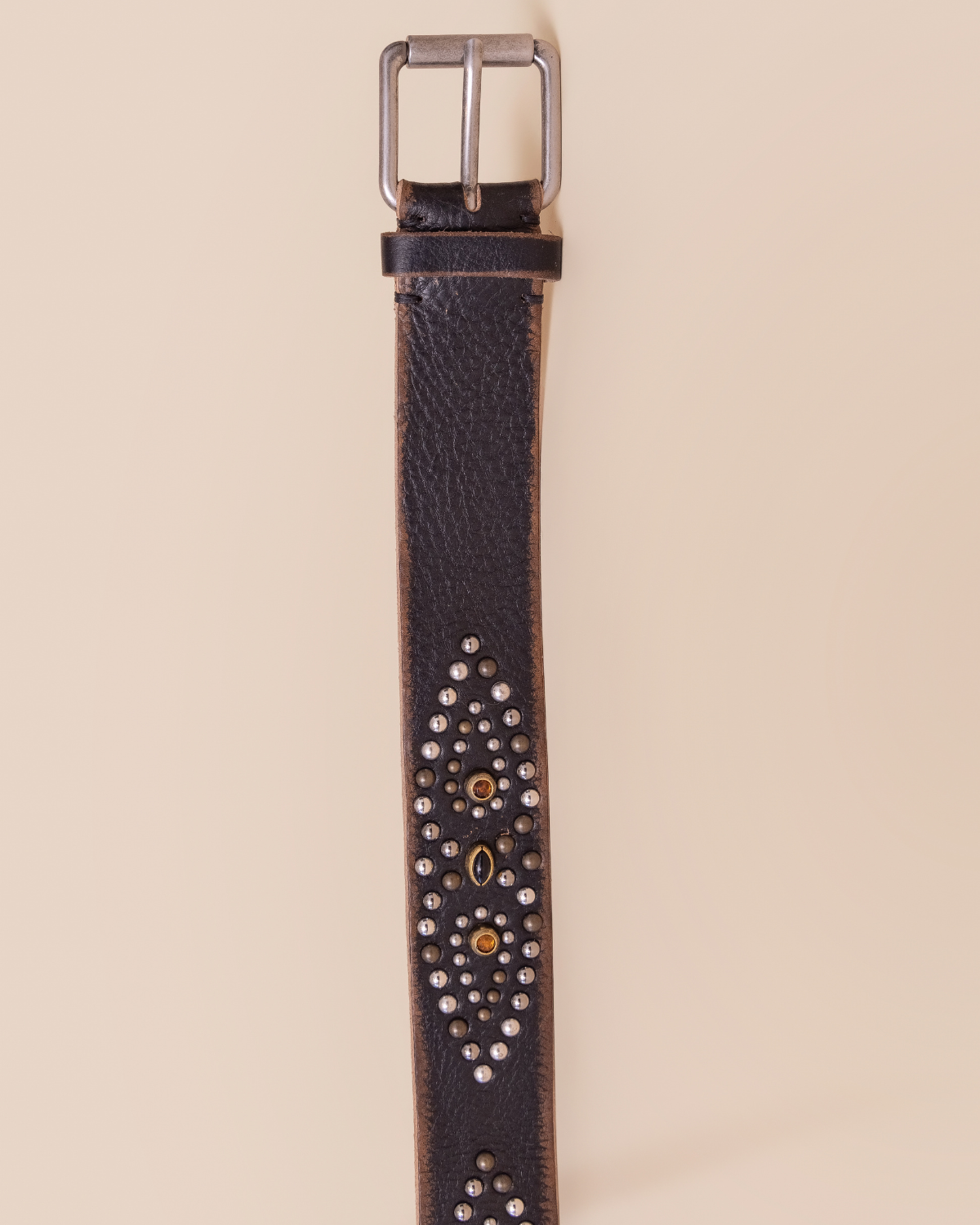 close-up — hardware arrangement on rich cammello brown leather