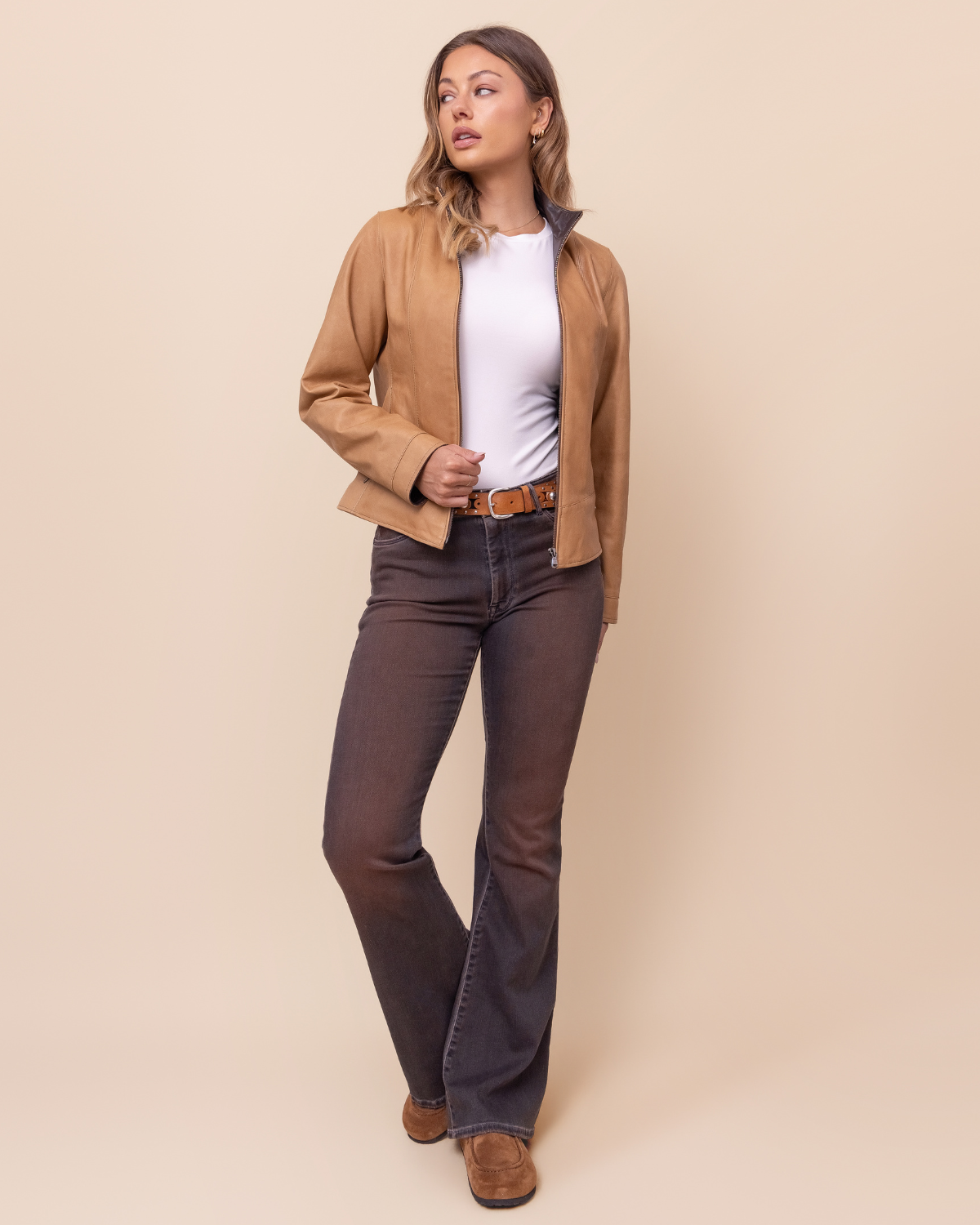 styled with tailored outerwear — flare silhouette and desert wash