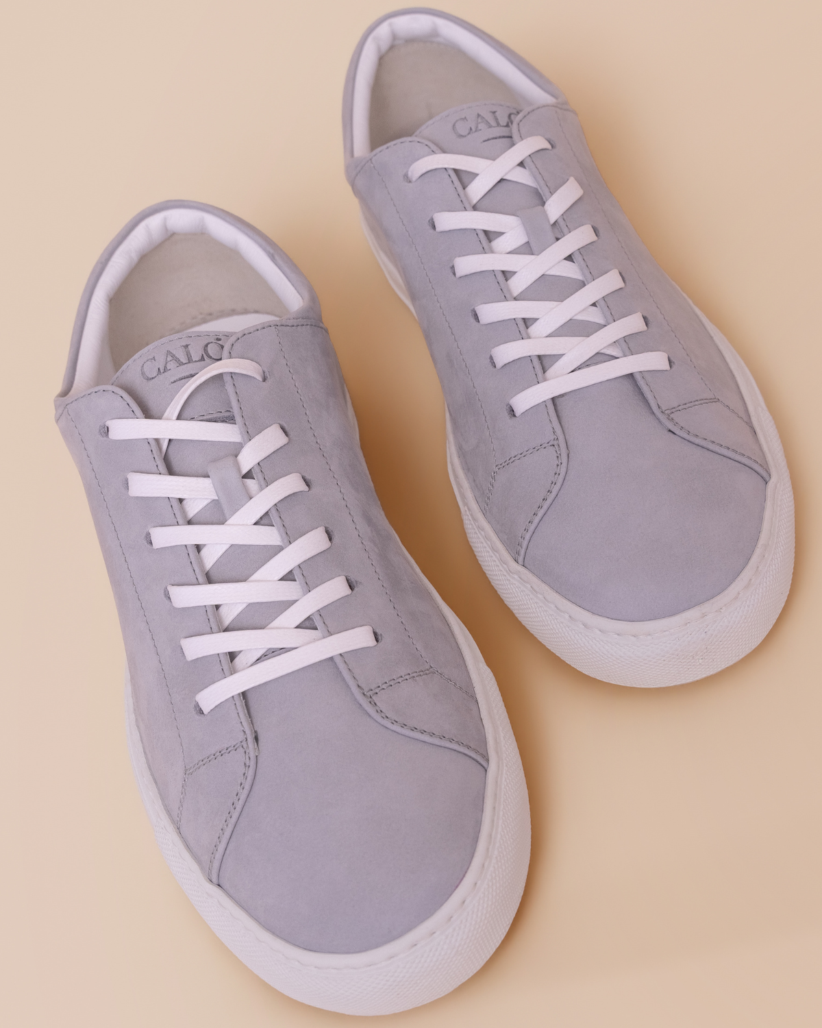 front view — grey nabuk upper and lace-up closure