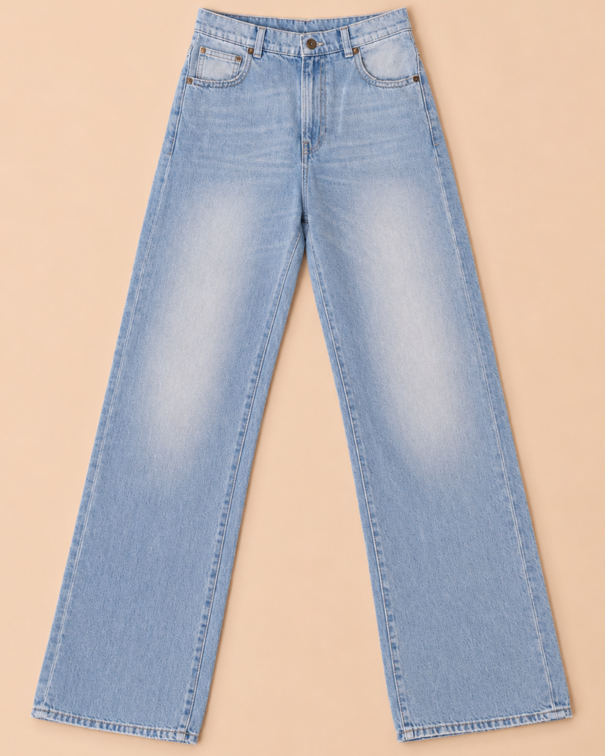 Light blue jeans on a beige background