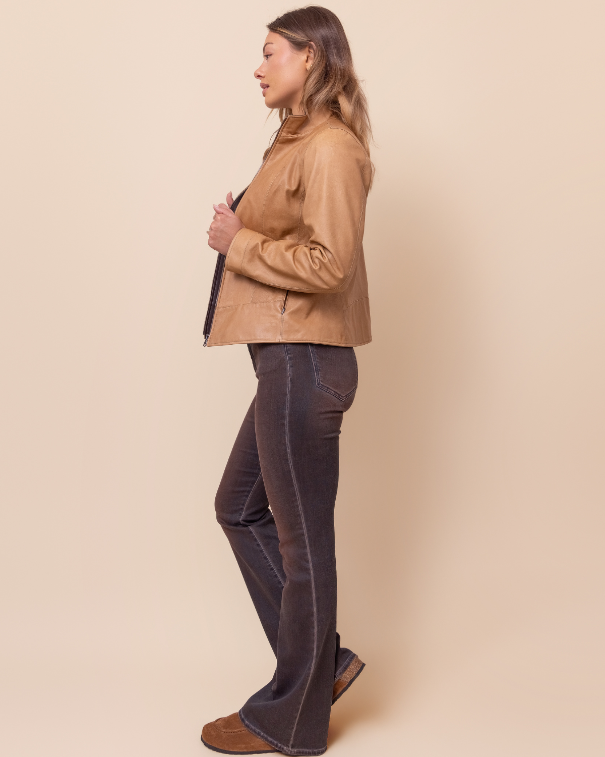 HYDE Sienna Jacket — close-up of waxy distressed lambskin texture and Rustic Napa trim, warm sand tone, 10 stitches per inch