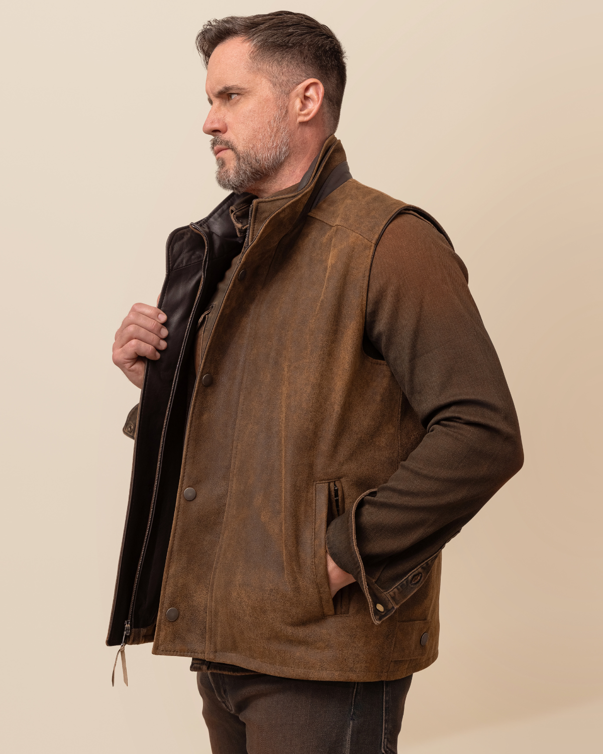Man wearing HYDE Sutter Vest in Trail Dust — distressed English lambskin leather vest, tailored fit, handcrafted in Los Angeles, sizes 36–52