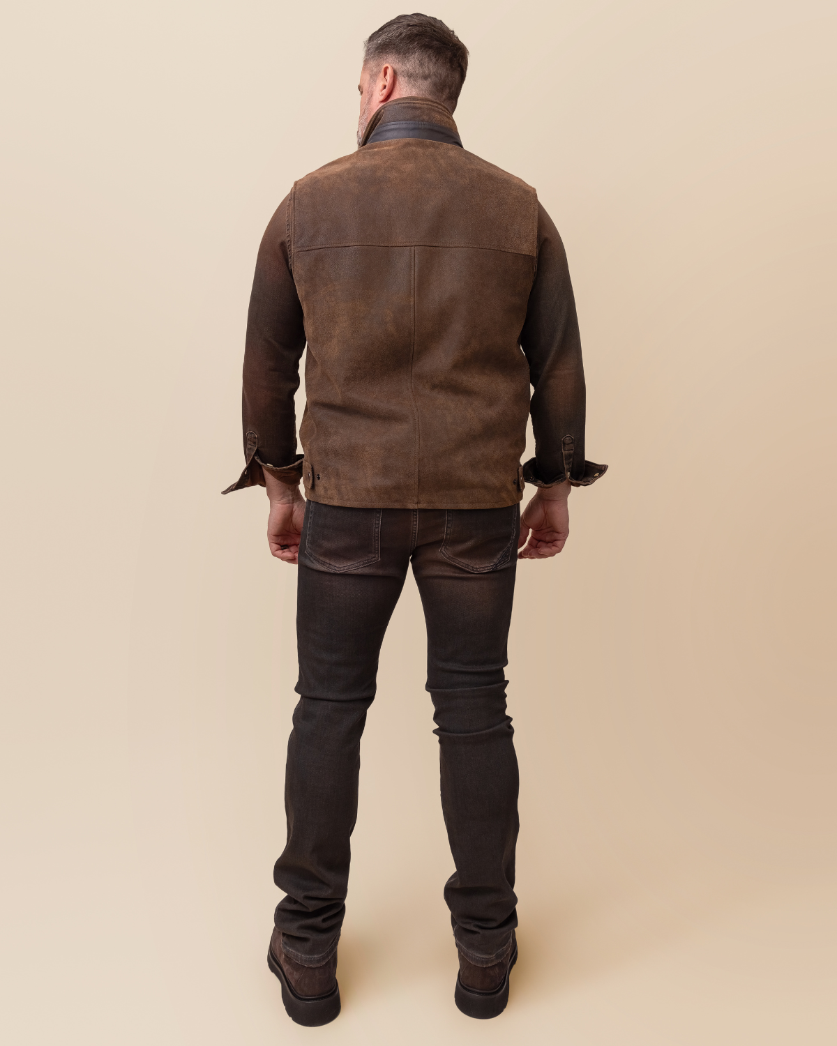 HYDE Sutter Vest — detail of vertical zip hand pockets and cognac Napa collar trim, Trail Dust lambskin, 10 stitches per inch