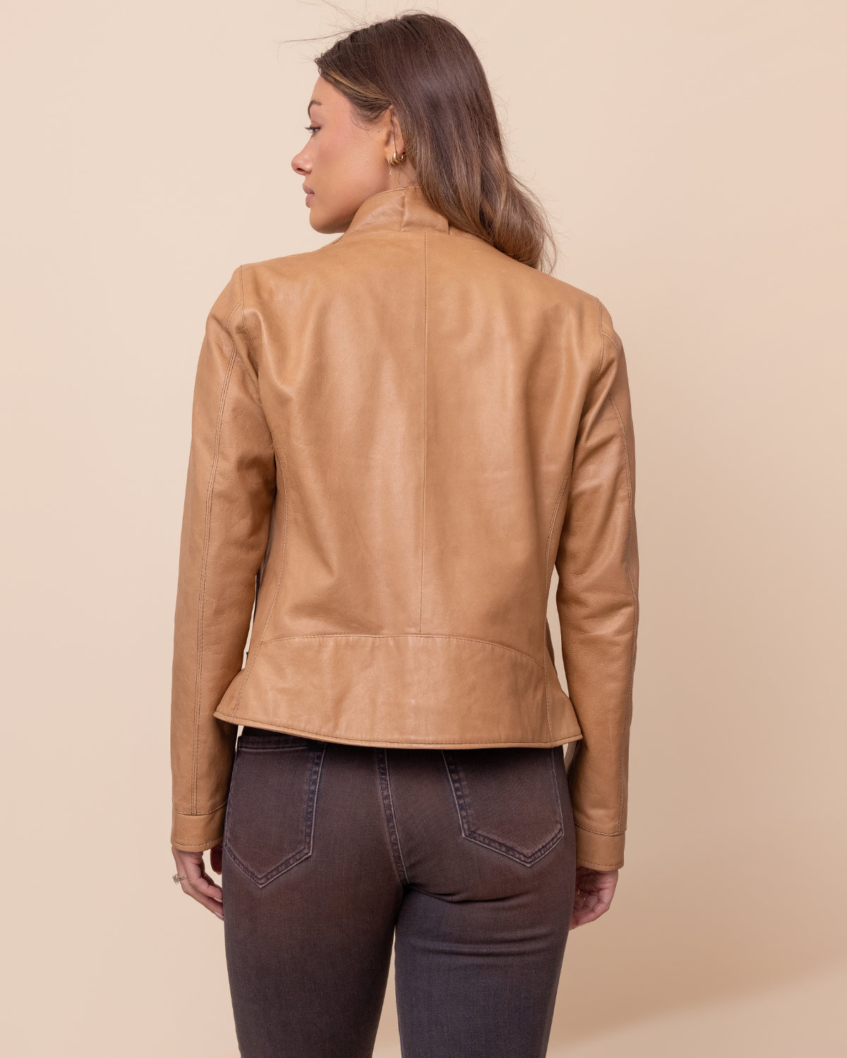 Woman wearing HYDE Sienna lambskin jacket in Sand Rustic — tailored silhouette, waxy distressed leather, USA-made
