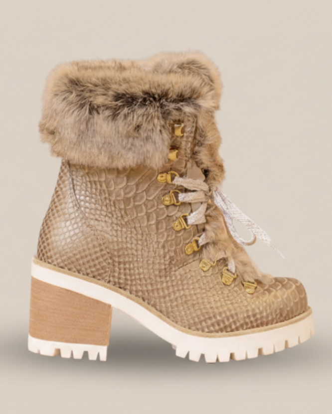 Beige winter boot with fur trim on a white background
