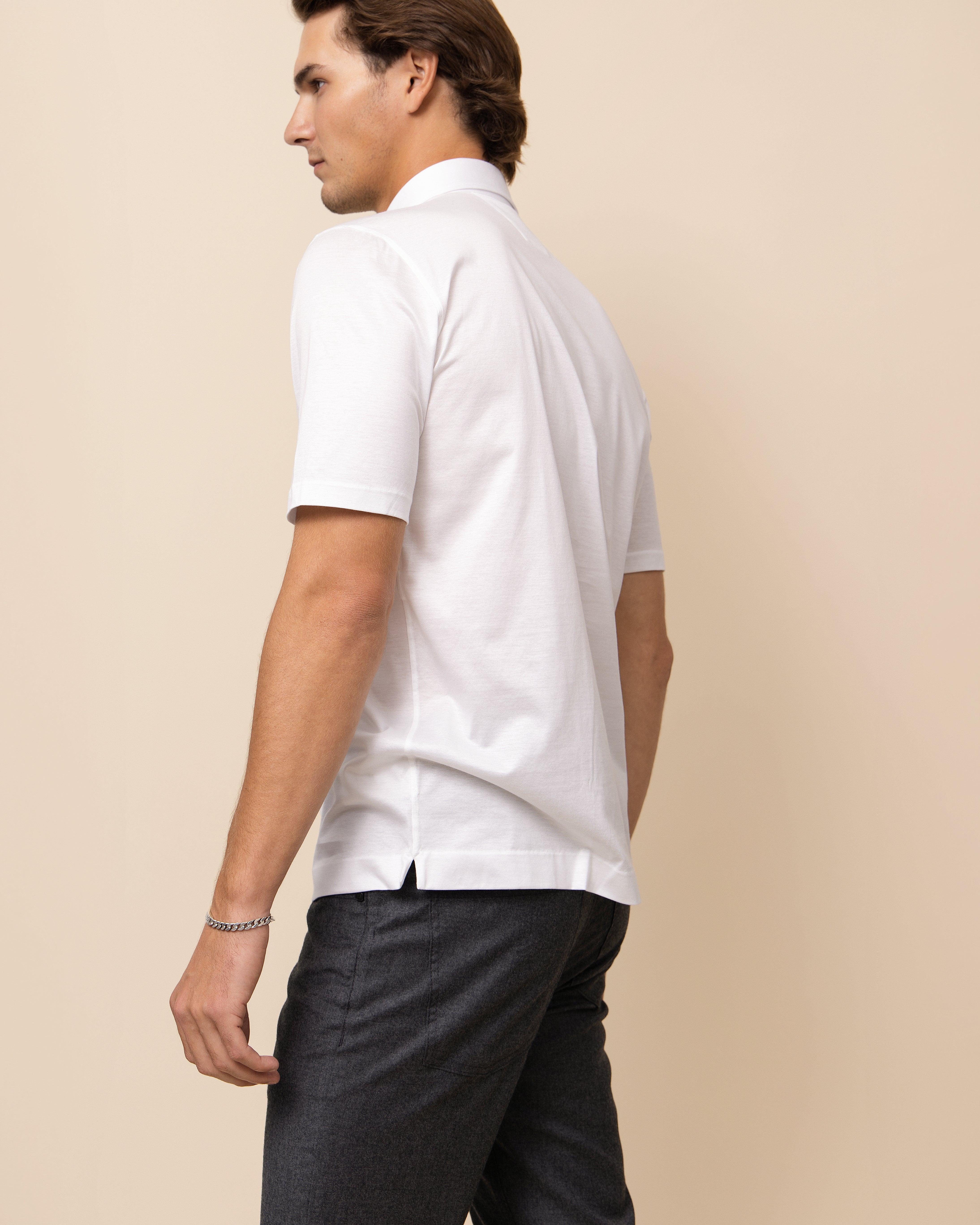 White HYDE Lucca polo — 100% Italian cotton jersey with an exceptionally smooth hand feel and refined silk-like sheen