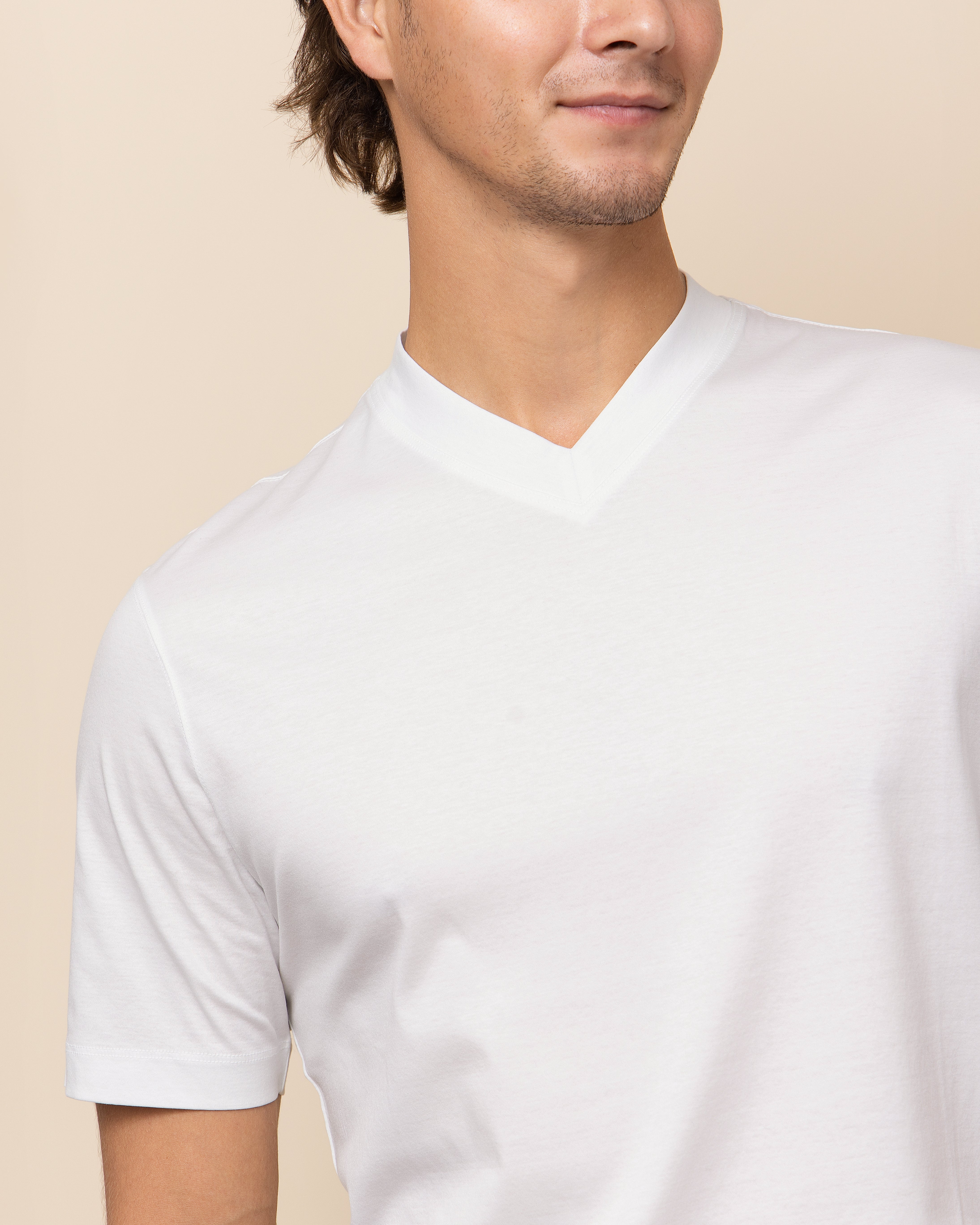 White Supima cotton V-neck tee showing tailored neckline and pique jacquard texture, HYDE Positano by Emiliano Zapata