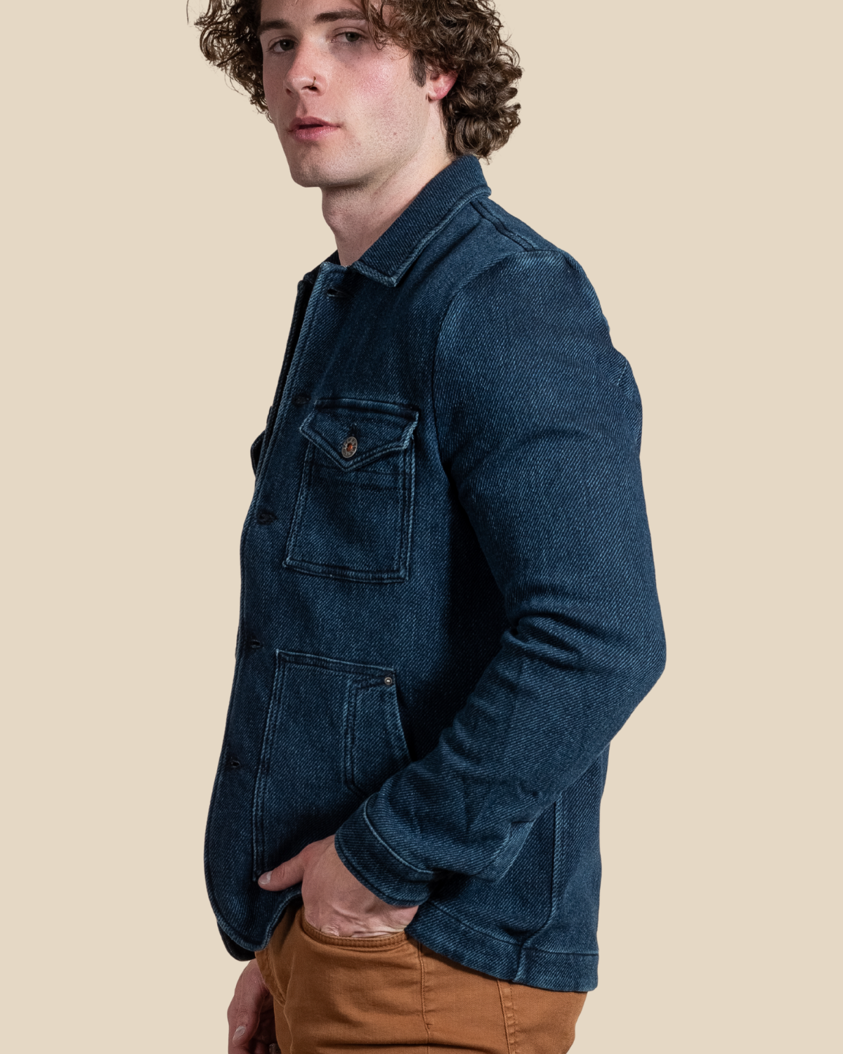 HYDE Tennessee blue chore jacket — lower patch pockets and topstitching on Italian cotton-blend twill