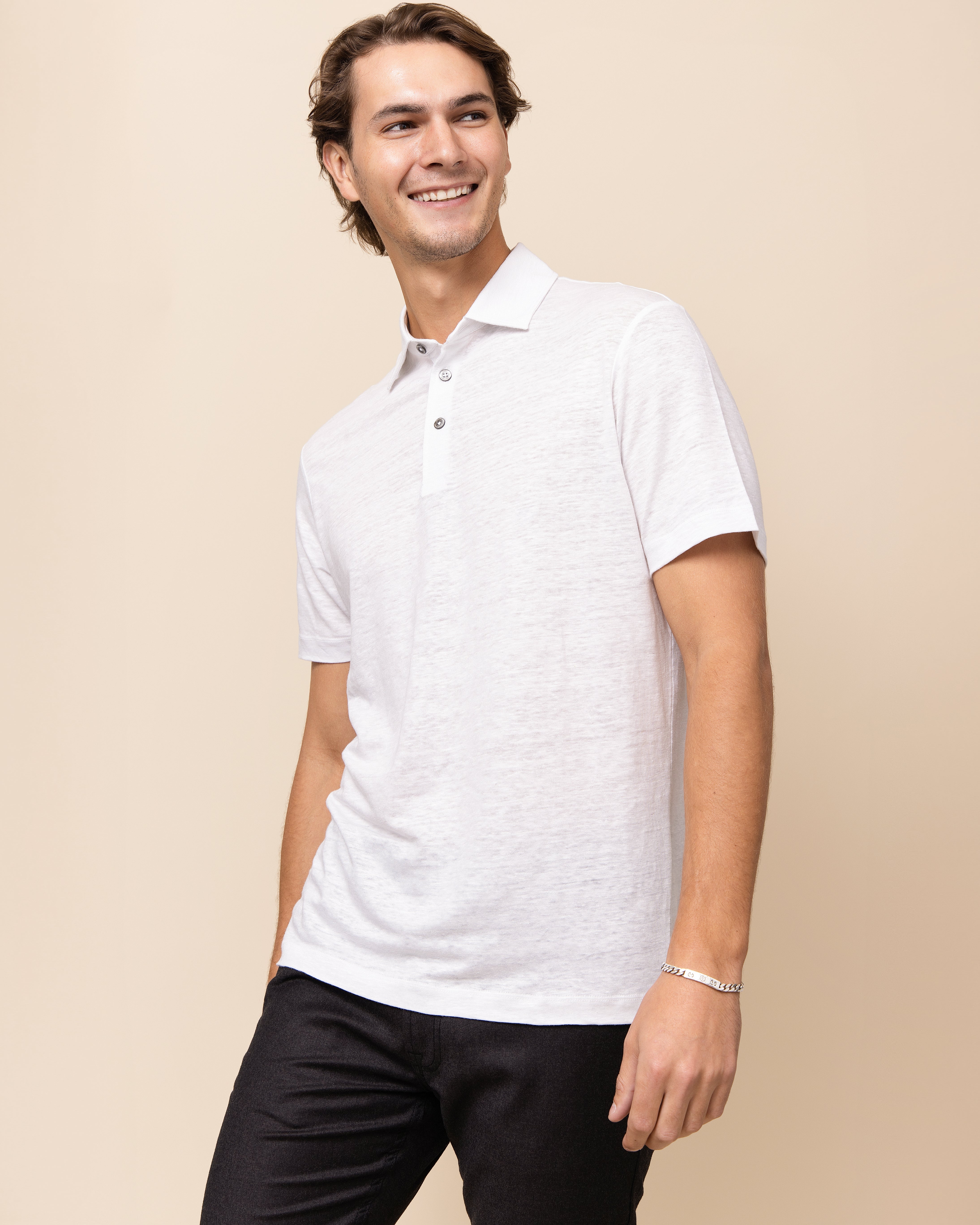 White 100% Italian linen knit polo showing collar, placket and mother-of-pearl buttons, HYDE Taormina by Emiliano Zapata