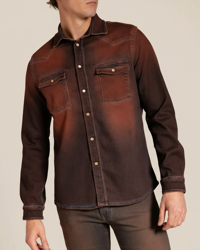 Rust denim shirt worn by a person on a beige background