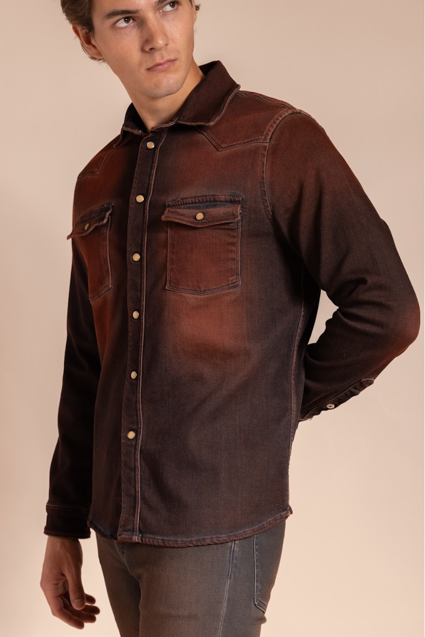 Man wearing a brown denim shirt on a beige background