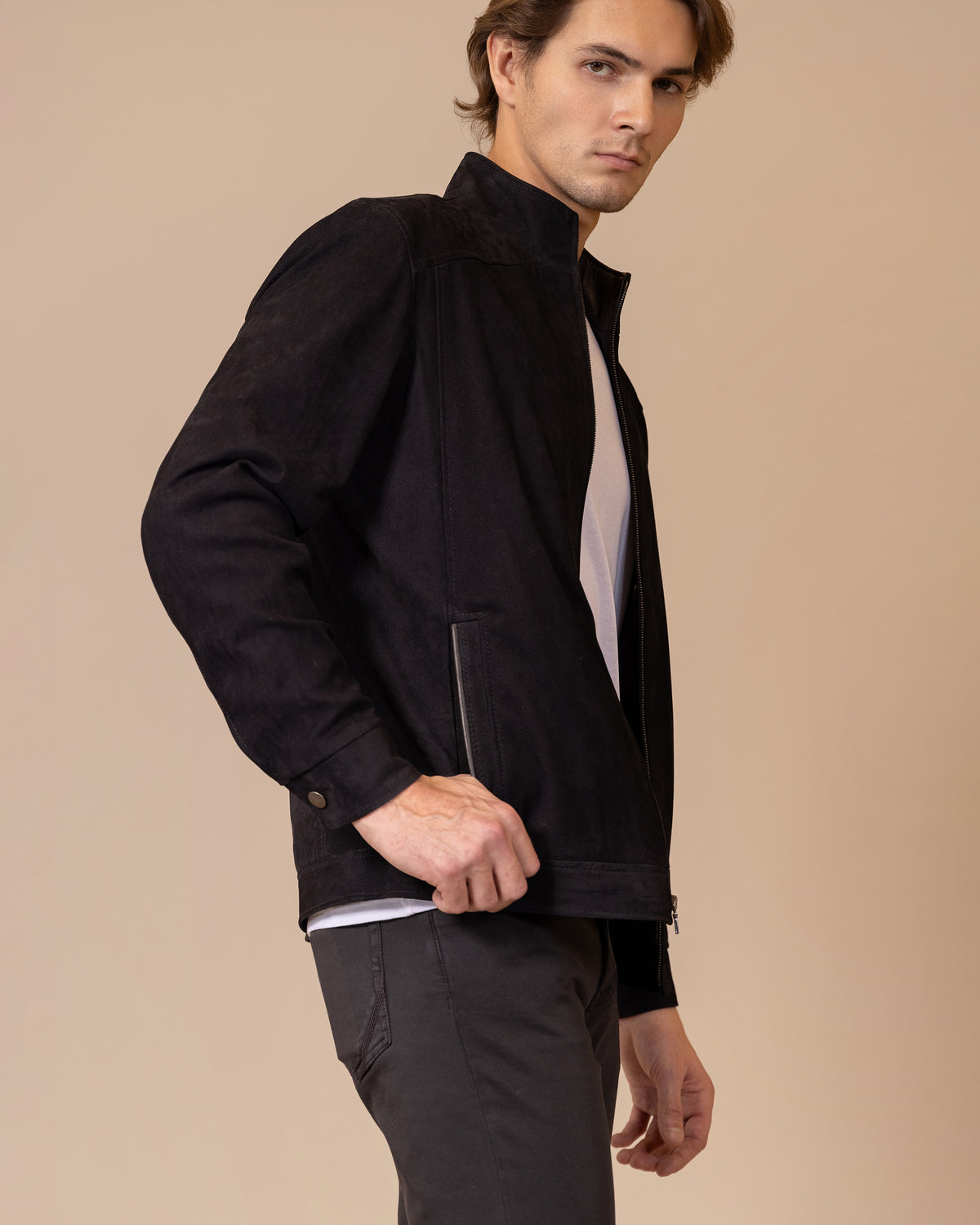 Opposite side profile of the Savio Ace Rustic nubuck calfskin jacket, showing tonal variation across the hand-finished leather.