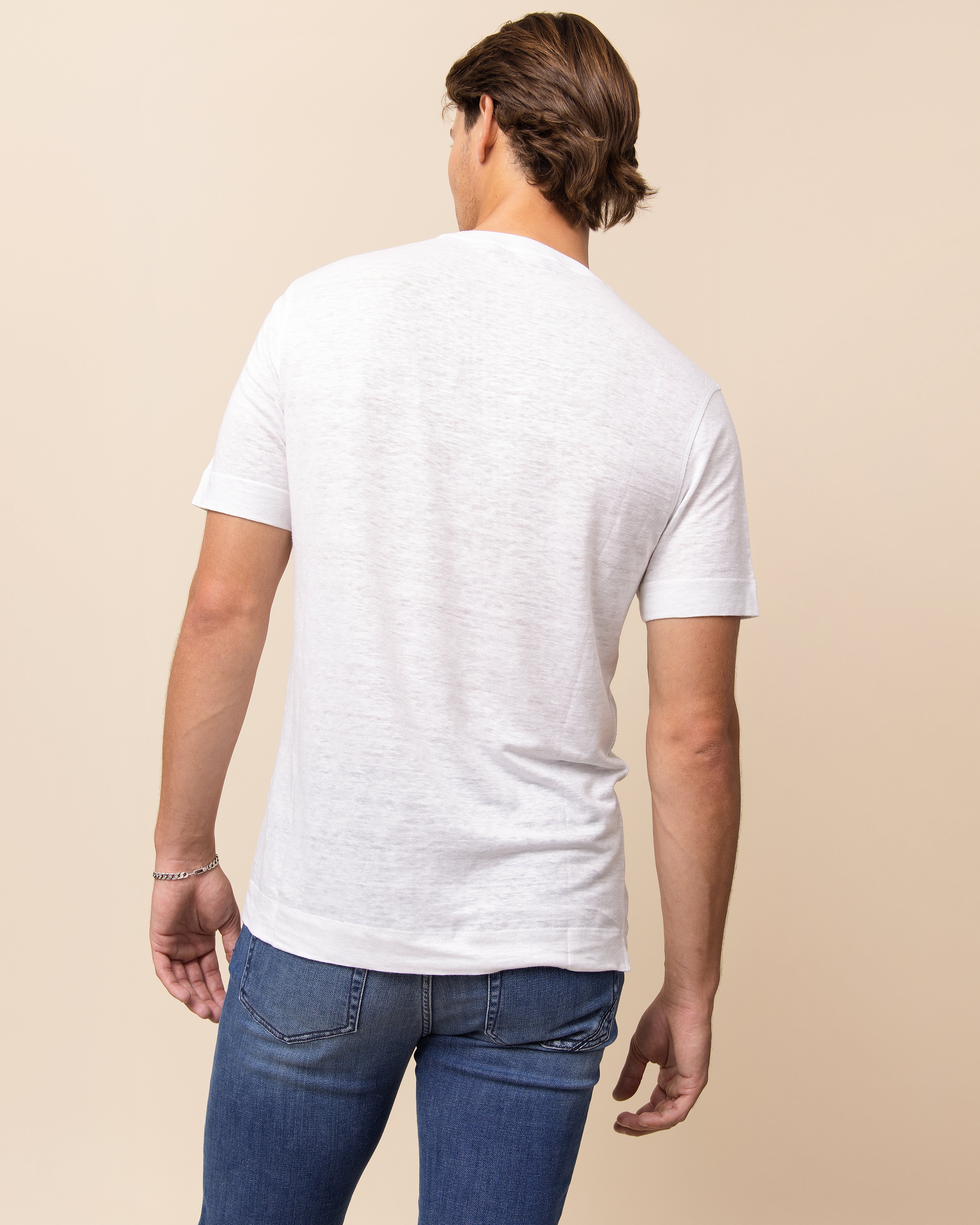 Emiliano Zapata white Italian linen tee for HYDE, quiet luxury resort wear warm-weather essential with clean sleeve and hem finish