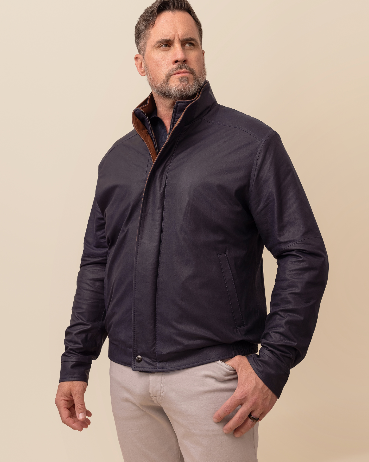 HYDE Forza Bomber — smooth Napa double collar detail against matte Navy lambskin suede shell, 10 stitches per inch construction