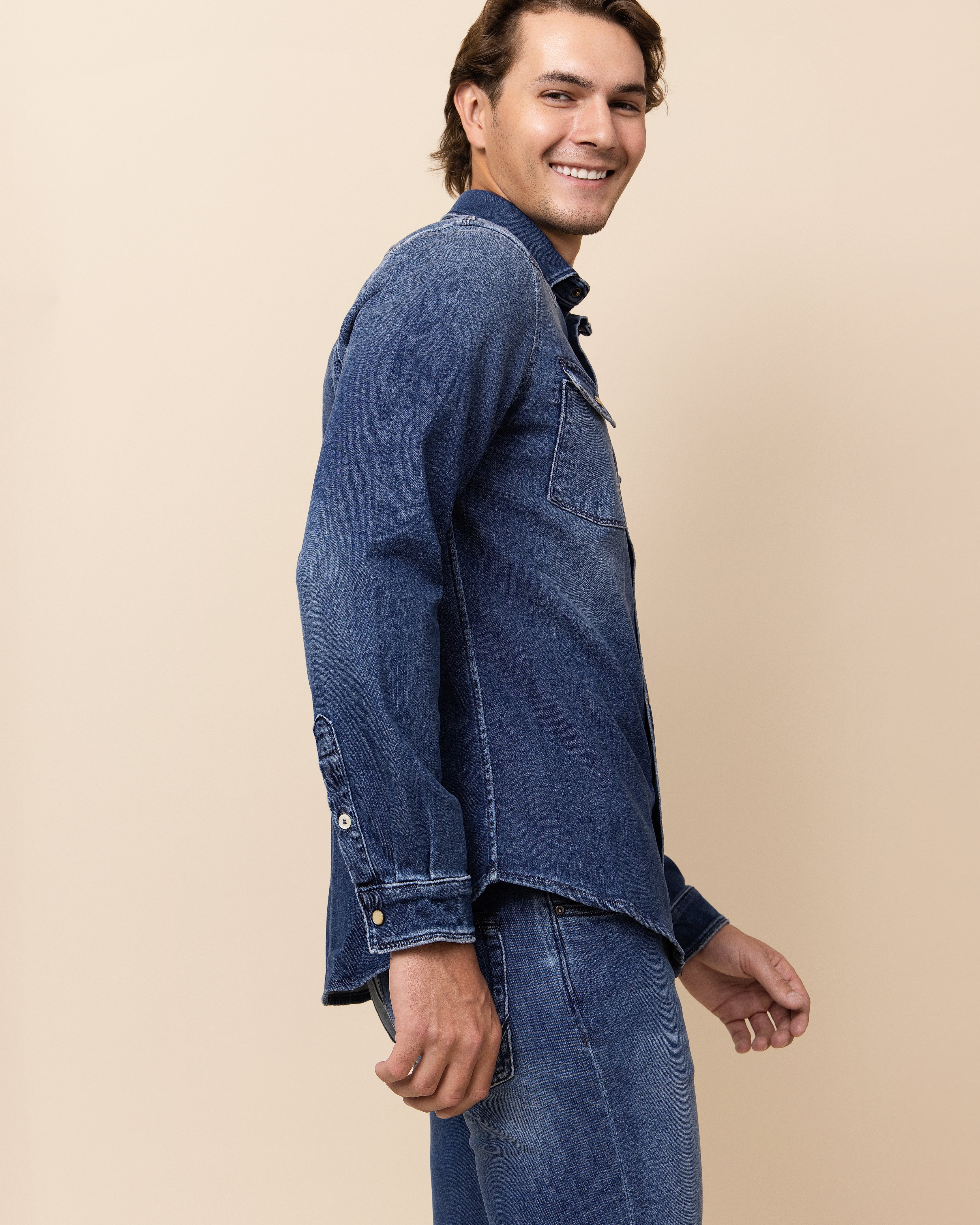 Dark Blue HYDE Weston western snap shirt — deep indigo sandblast and overdye finish creating tonal depth across Italian cotton-blend fabric