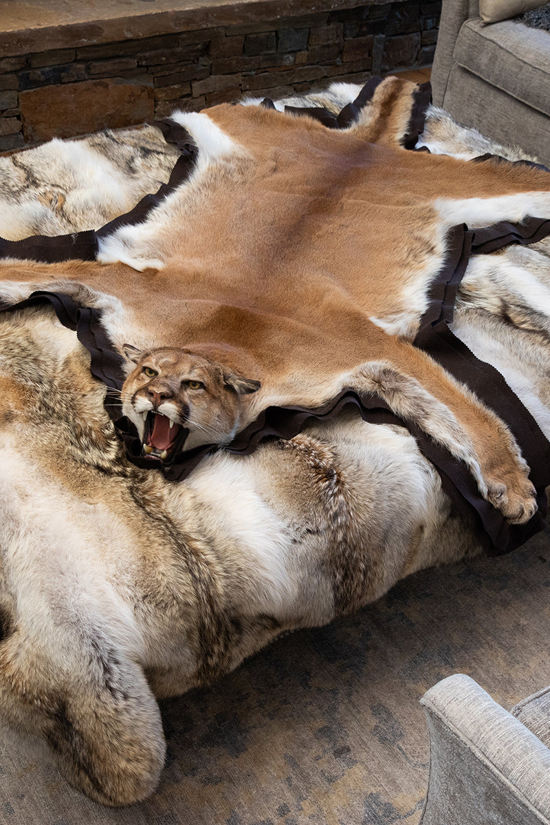 Mountain lion genuine fur rug — handcrafted luxury statement piece from Canadian and Alaskan fur for refined interiors