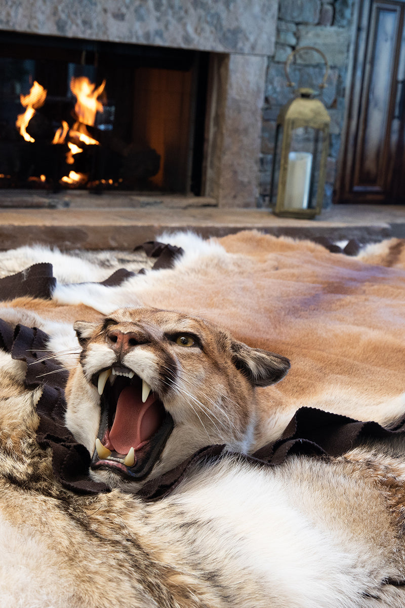 Mountain lion genuine fur rug — handcrafted luxury statement piece from Canadian and Alaskan fur for refined interiors